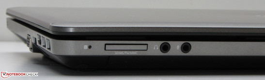 Передняя сторона: устройство для чтения карт памяти (SD, MMC), разъем для наушников, микрофонный вход
