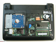 На фото видны жесткий диск, WLAN-модуль, оперативная память, батарейка и вентилятор системы охлаждения.