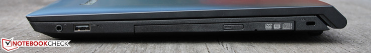 Справа: совмещенный аудиоразъем, USB 2.0, пишущий DVD, разъем для замка Kensington