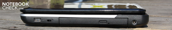 Справа: USB 2.0, Kensington, привод DVD, вход адаптера питания