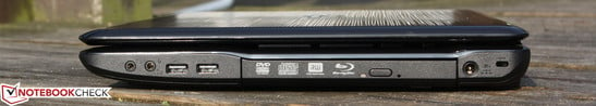 Справа: 2х Аудио, 2х USB 2.0, оптический привод (BluRay), вход адаптера питания, Kensington