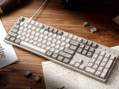 Keychron C2 Pro 8K на столе в окружении бумаг и книг
