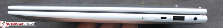 Справа: Слот для SIM-карты, вырез под замок безопасности, USB 3 (5 Гбит), аудио 3.5 мм