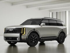 На фотографии представлен автомобиль Kia Telluride 2027 года в цвете «Ivory Silver»