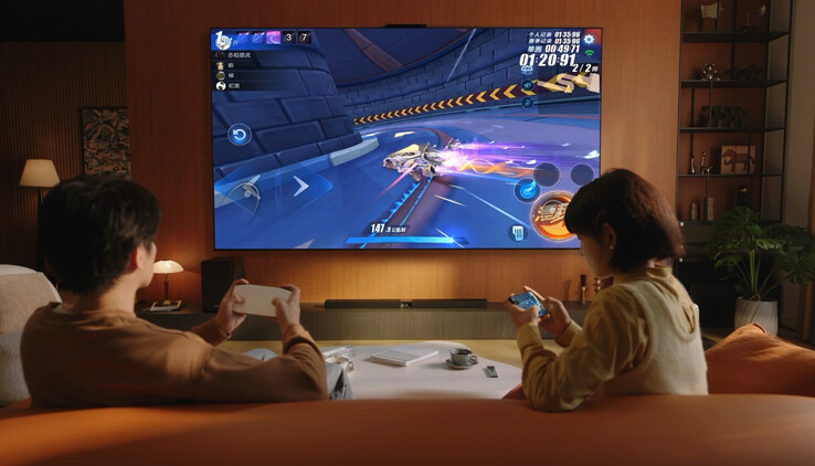 Huawei Mate TV Pro осуществляет беспроводную потоковую передачу игрового процесса со смартфона и управляется с помощью необычного пульта дистанционного управления с трекпадом. (Источник изображения: Huawei)