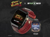 Игровые часы Street Fighter II: My Play Watch с красным ремешком, деталями с золотистым покрытием и вторым часовым дисплеем на тёмном текстурированном фоне.