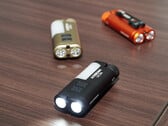 Фонарь Acebeam UC3A в трёх различных цветах.