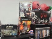 На фотографии представлена коллекция игр для PlayStation