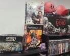 На фотографии представлена коллекция игр для PlayStation