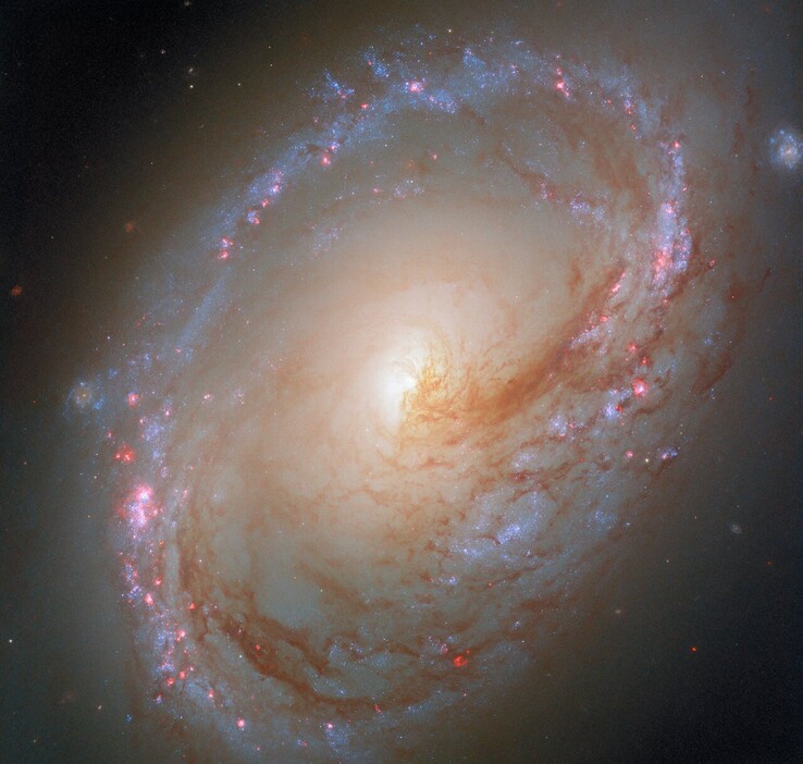 Последнее изображение галактики Messier 96 (Источник изображения: ESA, NASA, F. Belfiore и D. Calzetti)