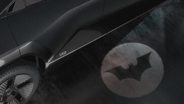Лужа на зеркале крыла Mahindra Batman EV (Источник изображения: Mahindra)