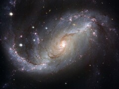Изображение, показывающее галактику NGC 1672 и звезды во Вселенной. (Источник изображения: WikiImages - Pixabay)