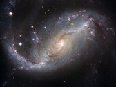 Изображение, показывающее галактику NGC 1672 и звезды во Вселенной. (Источник изображения: WikiImages - Pixabay)
