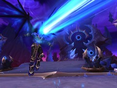 Сцена из World of Warcraft, в которой заклинателя взрывает пылающий синий луч (Источник изображения: Windowscentral.com)