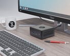 Стоимость Nano Pro Gen 14 начинается от €840. На фото: мини-ПК рядом с монитором, клавиатурой, чашкой для чая и ручкой. (Источник изображения: Tuxedo)
