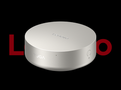 Мини-ПК Lenovo Yoga Mini i, изображенный на черном фоне с логотипом Lenovo сверху. (Источник изображения: Lenovo - отредактировано)