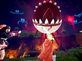 Скриншот Palworld показывает, как персонажи сражаются с плавающим глазным яблоком с острыми зубами