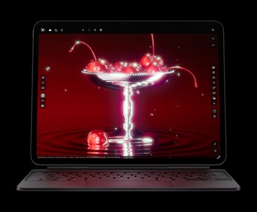 Apple iPad Pro M5 с клавиатурой Magic Keyboard демонстрирует 3D-рендер вишни, демонстрируя OLED-дисплей Ultra Retina XDR и графику чипа M5 (Источник изображения: Apple)