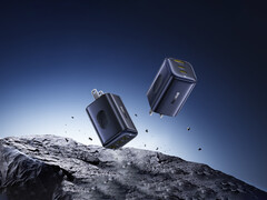 Новый PicoGo 67 W AE11 стоит $39,99. На фото: Рекламная фотография быстрого зарядного устройства, парящего в воздухе над камнями. (Источник изображения: Baseus)