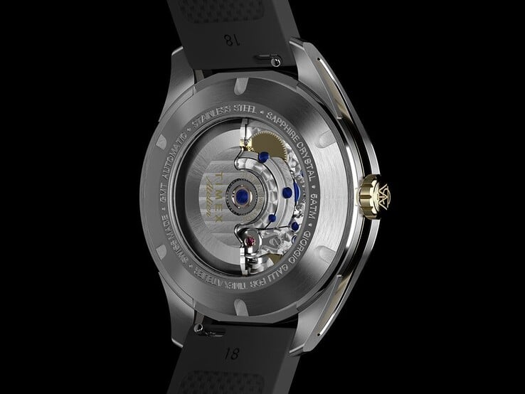Вид сзади часов Timex Atelier GMT Première M1a, демонстрирующий их автоматический механизм GMT через прозрачную заднюю крышку корпуса.