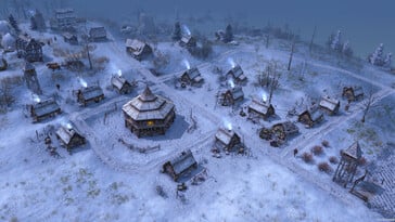 Изображение, на котором запечатлена заснеженная деревня в игре «Farthest Frontier».