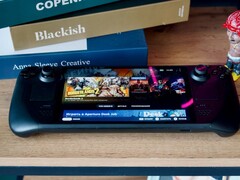 Устройство Steam Deck сидит на столе (Источник изображения: Georgiy Lyamin via Unsplash)