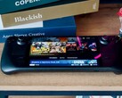 Устройство Steam Deck сидит на столе (Источник изображения: Georgiy Lyamin via Unsplash)