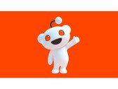 Рекламное изображение талисмана Reddit, Сну, машущего зрителю и позирующего на красном фоне. (Источник изображения: Reddit)