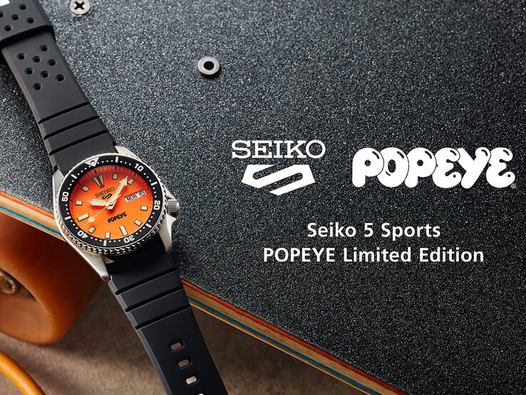 Альтернативный текст: Вид под углом на часы Seiko 5 Sports x Popeye HDB013, на котором видны оранжевый циферблат, чёрный вращающийся безель и корпус из нержавеющей стали.