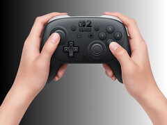 Контроллер Nintendo Switch 2 Pro, подвергшийся разборке, показан в руках (Источник изображения: Nintendo of America с правками)