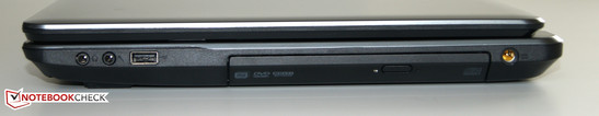 Слева: 3.5-мм аудиоразъемы (наушники и микрофон), USB 2.0, DVD-привод, разъем питания