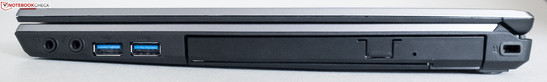 Справа: 3.5-мм аудиоразъемы, 2 порта USB 3.0, DVD-привод, замок Kensington