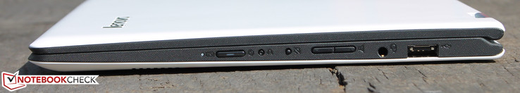 Справа: кнопка питания, кнопка восстановления системы, регулятор громкости, 3.5-мм аудиоразъем