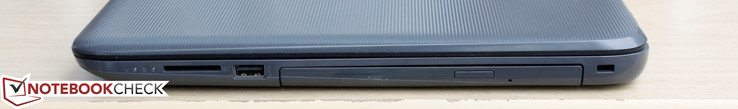 Справа: SD-кардридер, USB 2.0, DVD-дисковод, слот замка Kensington