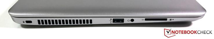 Слева: слот замка Kensington, решетка системы охлаждения, USB 2.0 (усиленный для зарядки гаджетов), комбинированный аудио разъем, кардридер
