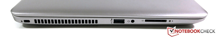 Слева: слот замка Kensington, решетка радиатора, USB 2.0 (усиленный для зарядки устройств), комбинированный аудиоразъем, SD-кардридер