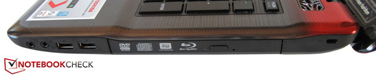 Справа: Аудиоразъемы, 2x USB 2.0, Blu-ray привод, разъем для замка Кенсингтона
