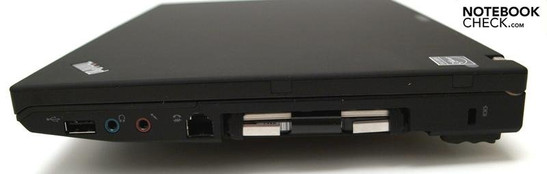 Справа: USB 2.0, наушники, микрофон, жесткий диск (крышка убрана), Kensington