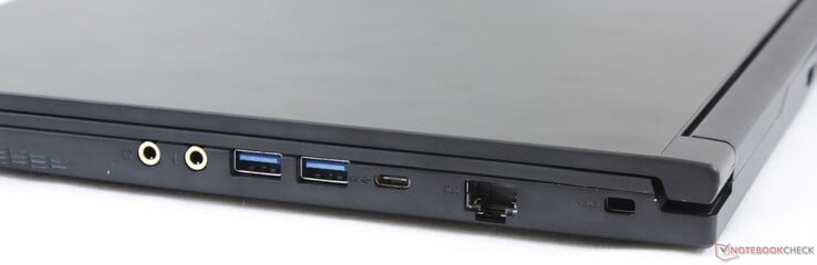 Правая сторона: выход на наушники, микрофонный вход, 2x USB 3.2 Type-A, USB 3.2 Type-C, гигабитный Ethernet, слот замка Kensington