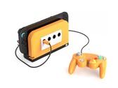 Retro Fighters BattleDock с оранжевой лицевой панелью. (Источник изображения: Retro Fighters/Kickstarter)
