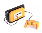 Retro Fighters BattleDock с оранжевой лицевой панелью. (Источник изображения: Retro Fighters/Kickstarter)