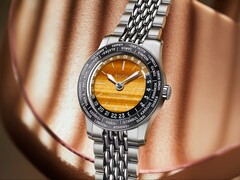 Балтийские часы Heures du Monde с циферблатом из тигрового глаза