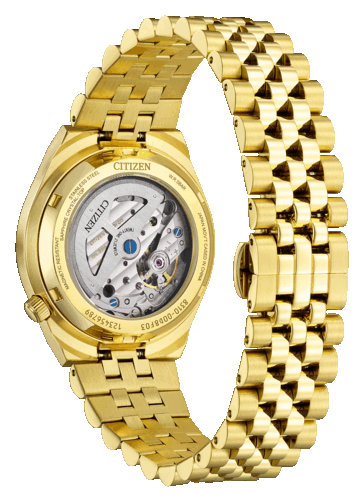 Прозрачная задняя крышка корпуса часов Citizen Tsuyosa 60, демонстрирующая автоматический механизм собственного производства калибра 8310 и корпус из нержавеющей стали с золотистым оттенком.