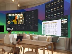 Пользователь работает с виртуальным рабочим столом с помощью гарнитуры Apple Vision Pro (Источник изображения: Apple)