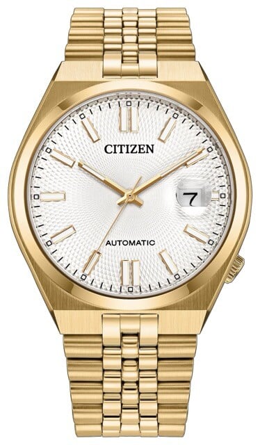 Автоматические часы Citizen Tsuyosa 60 с корпусом из нержавеющей стали золотистого цвета и браслетом в стиле «Jubilee», белым циферблатом с гильошированным узором и увеличительным стеклом «циклоп» для даты.